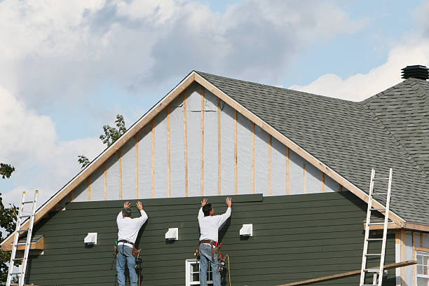 Professional Siding Installation technician working in Copiague, NY